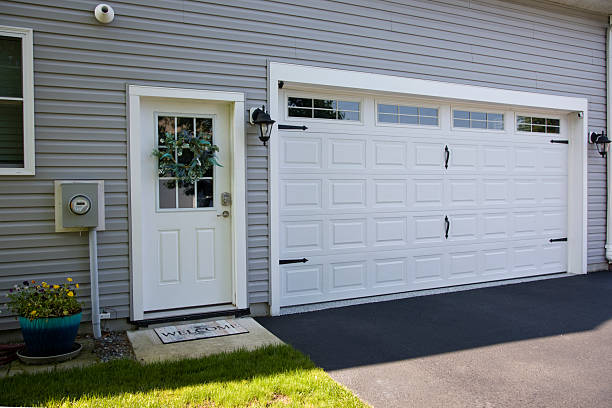 24/7 Emergency Garage Door Panel Replacement experts in High Rolls, NM